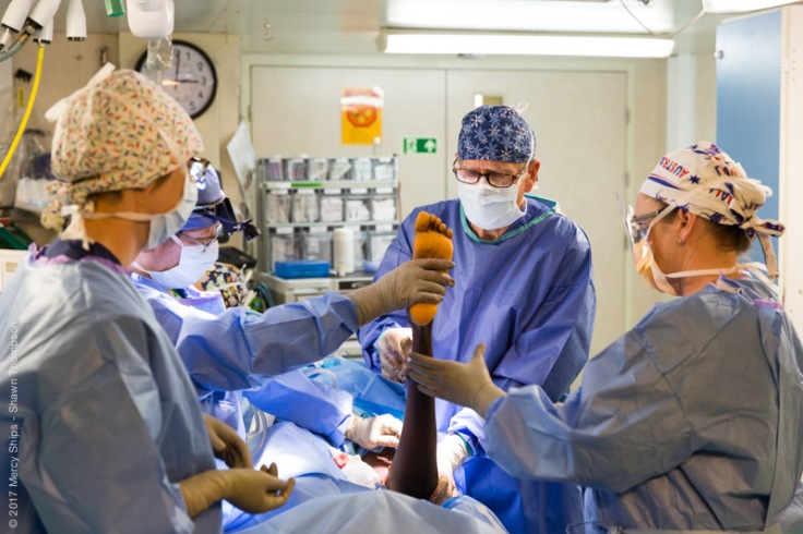 Dr. Frank Haydon, Orthopedic Surgeon, performing an operation.